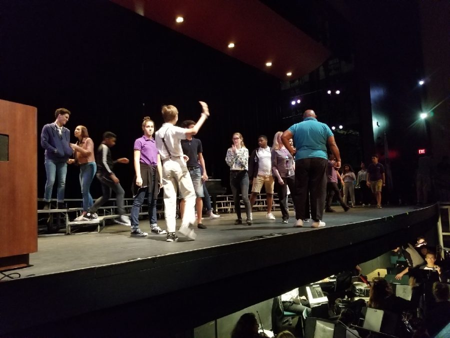 Some cast members of West Side Story in their tech rehearsal 