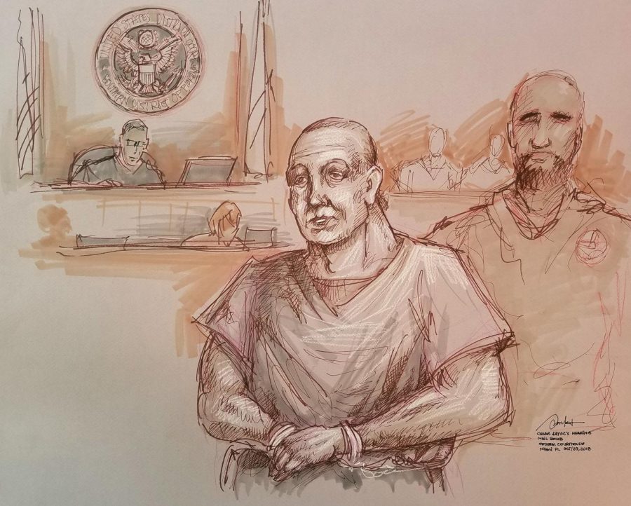 Pipe Bomb Package suspect Cesar Sayoc handcuffed in court.