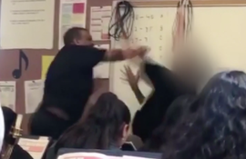 Teacher punches student.