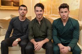 The Jonas Brothers are reuniting to record new music, US Weekly Reports.