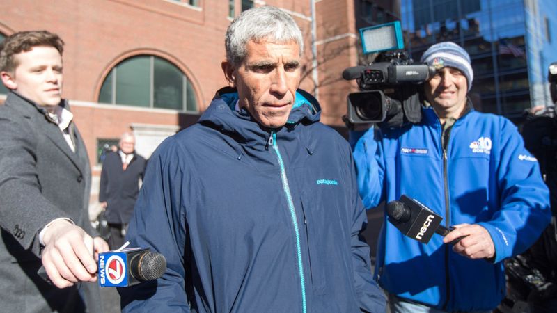 William "Rick" Singer exiting Boston federal court after pleading guilty to money laundering, racketeering, obstruction of justice and conspiracy to defraud the United States.