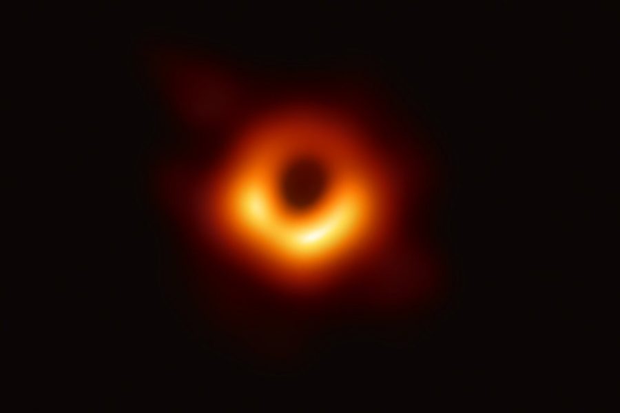 Researchers have taken the first photograph of a black hole. Located at the center of the Messier 87 galaxy, the black hole has a mass 6.5 billion times greater than the Sun