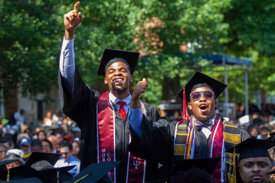 The Morehouse College graduates after hearing billionaire and philanthropist Robert F. Smith say that he would pay student loan debts.