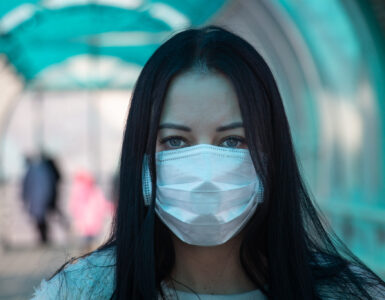 A young woman with a mask, during the coronavirus pandemic.