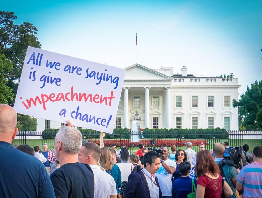A+protest+calling+for+Trumps+impeachment+happening+outside+the+White+House.+