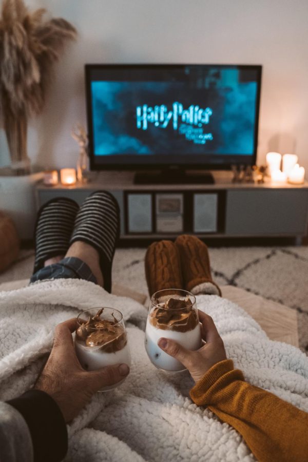 Fans+settle+down+to+watch+the+Harry+Potter+Reuinon+special.