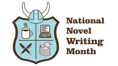 The NaNoWriMo coat of arms includes a writers most valuable necessities.