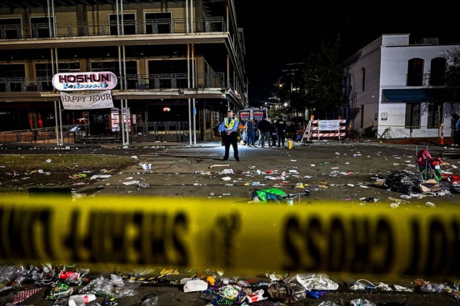 Police officers on scene after a shooting that occurred during the Krewe of Bacchus parade in New Orleans on Feb. 19, 2023.