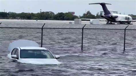 A stalled car in Fort Lauderdale floodwater due to the heavy rain. 