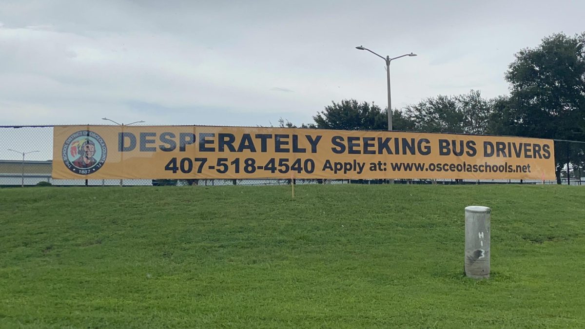 A Sign posted outside the bus yard on Simpson advertising the open bus driver positions.