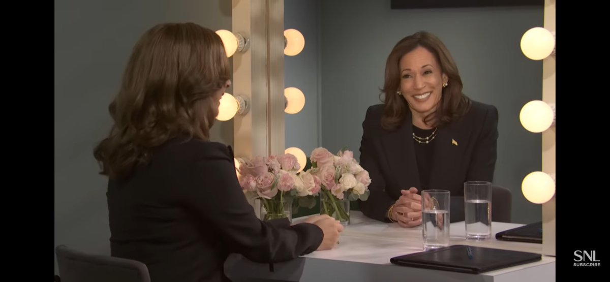 Ms. Rudolph turns to her mirror image- Kamala Harris!