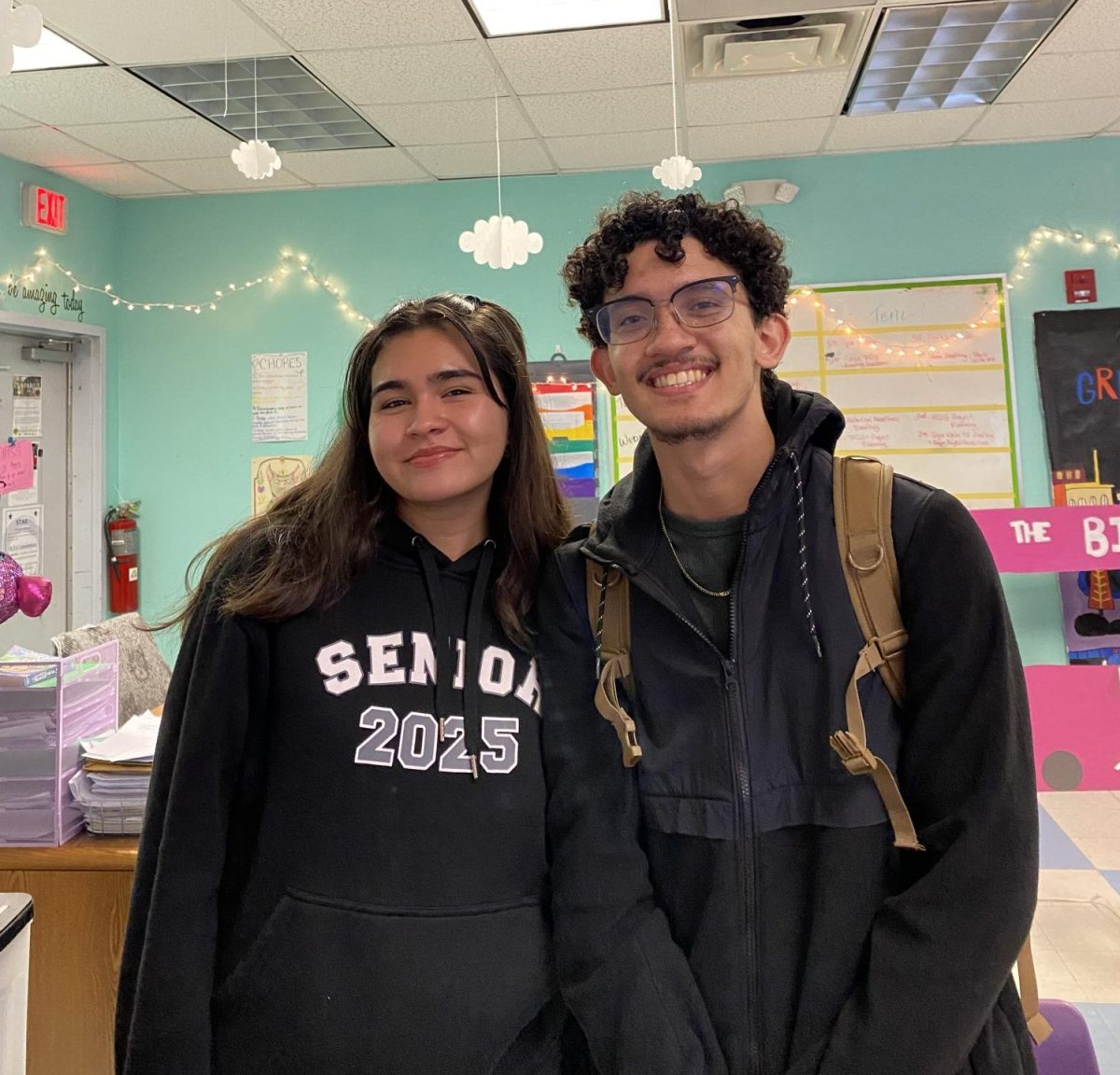 Senior Creative Writers Isabel Tercero and Jayson Nieves excitedly prepare to graduate!