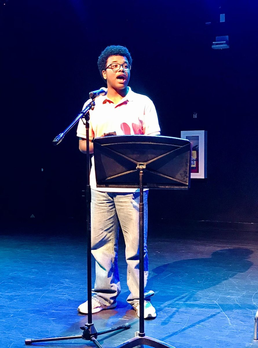 Poet, Samuel Murillo-Hernandez, performing his poem at Soulful Sounds