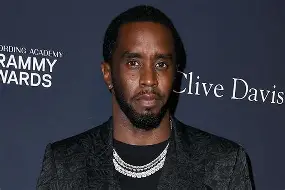 Sean "Diddy" Combs face on a background from an event.