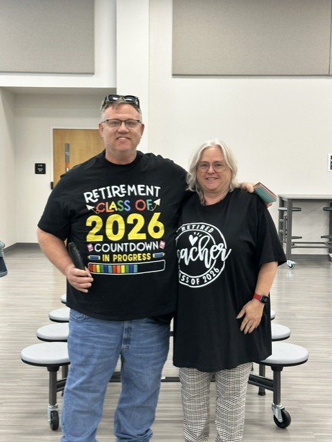 Mr. and Mrs. McBride after announcing that they will be retiring together.